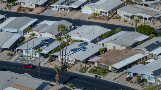 Aerial detail of Palm Desert Greens homes, patios, carports and an interior street