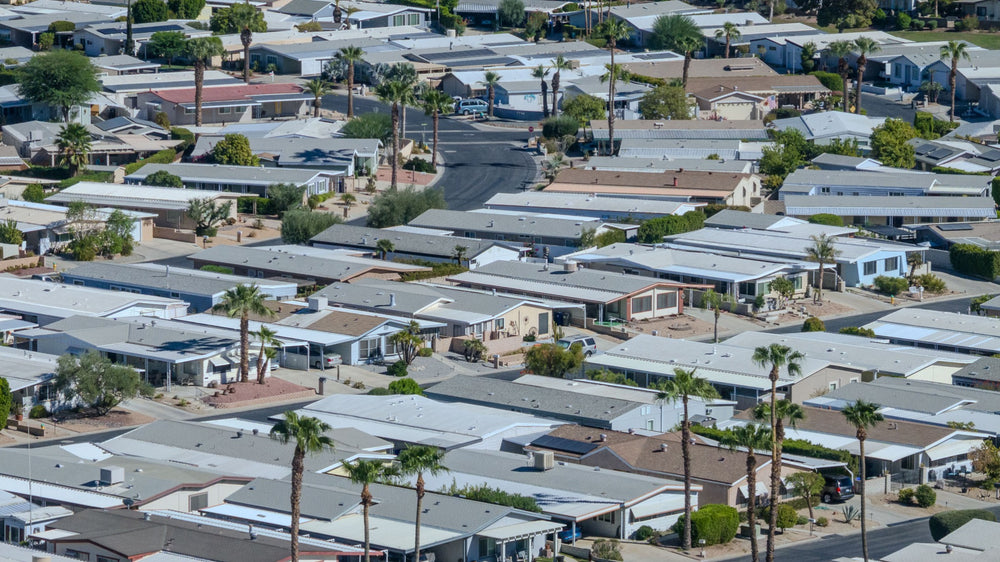 Rows of Palm Desert Greens homes with carports and covered patios