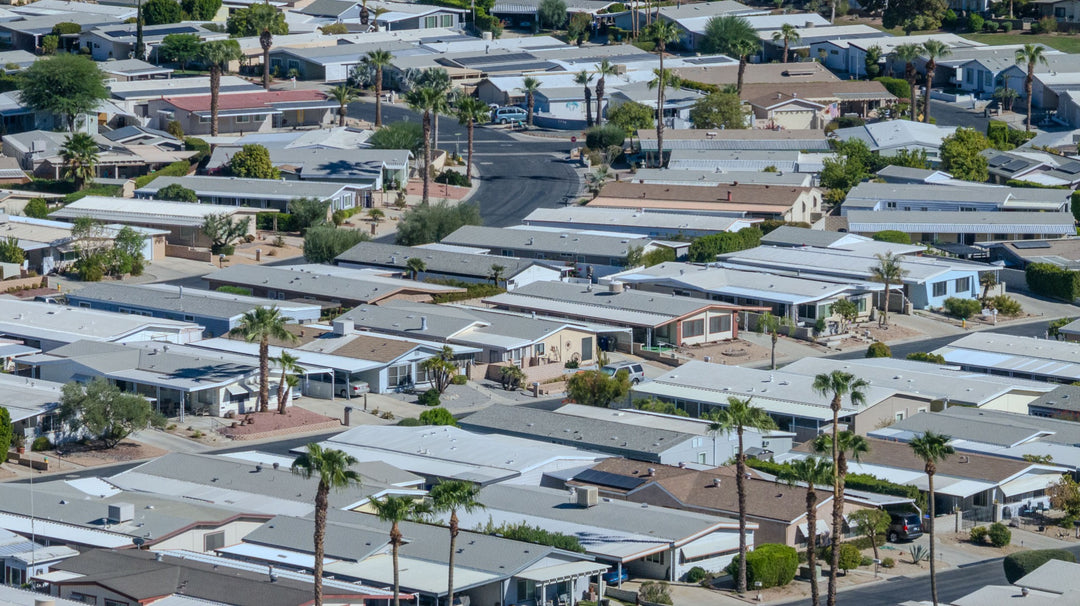 Rows of Palm Desert Greens homes with carports and covered patios