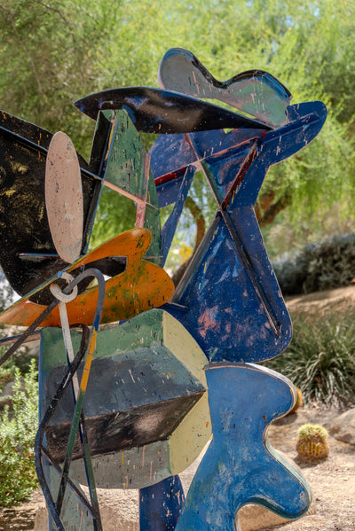 Blue and multicolored painted-steel forms in Peter Reginato’s Midnight and Morning Rain… Waiting for Miro at Faye Sarkowsky Sculpture Garden.