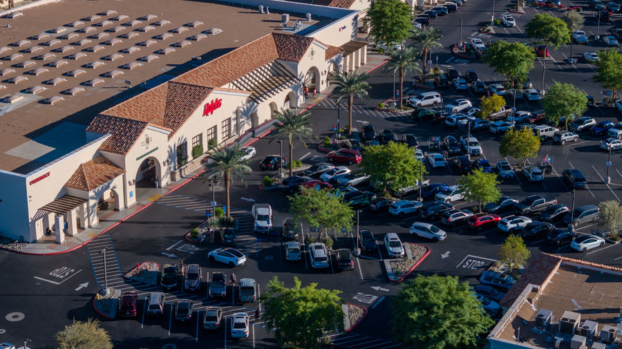 Ralphs storefront and parking area at Citrus Plaza in Indio, photographed from above. Photograph by Mark Miller, October 27, 2026.