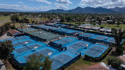 Tennis and pickleball courts with mountain views at Rancho Las Palmas