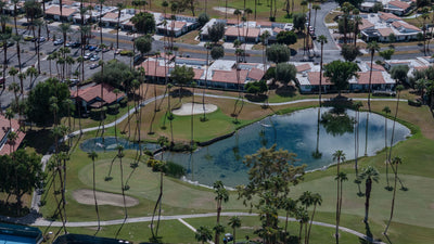 Golf green, lake and homes at Rancho Las Palmas Country Club