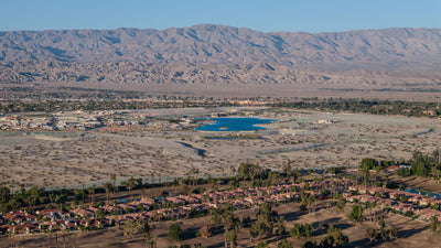 Rancho Mirage Country Club in the foreground, with Cotino’s lagoon and surrounding development beyond.