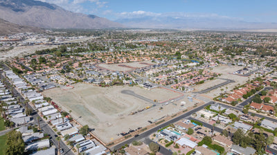 Wide aerial of Rio del Sol homes and prepared development areas in Cathedral City.