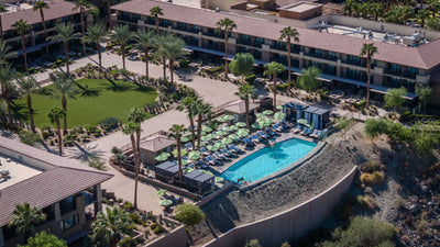 Curved pool terrace and resort buildings at The Ritz-Carlton, Rancho Mirage