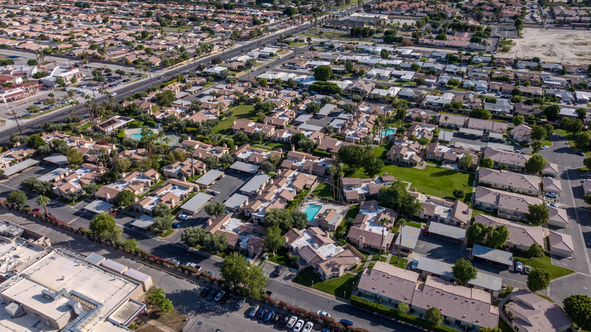 Aerial overview of Summer Breeze condominiums and pools in Indio