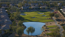 Golf course with a lake surrounded by residential houses in scsh