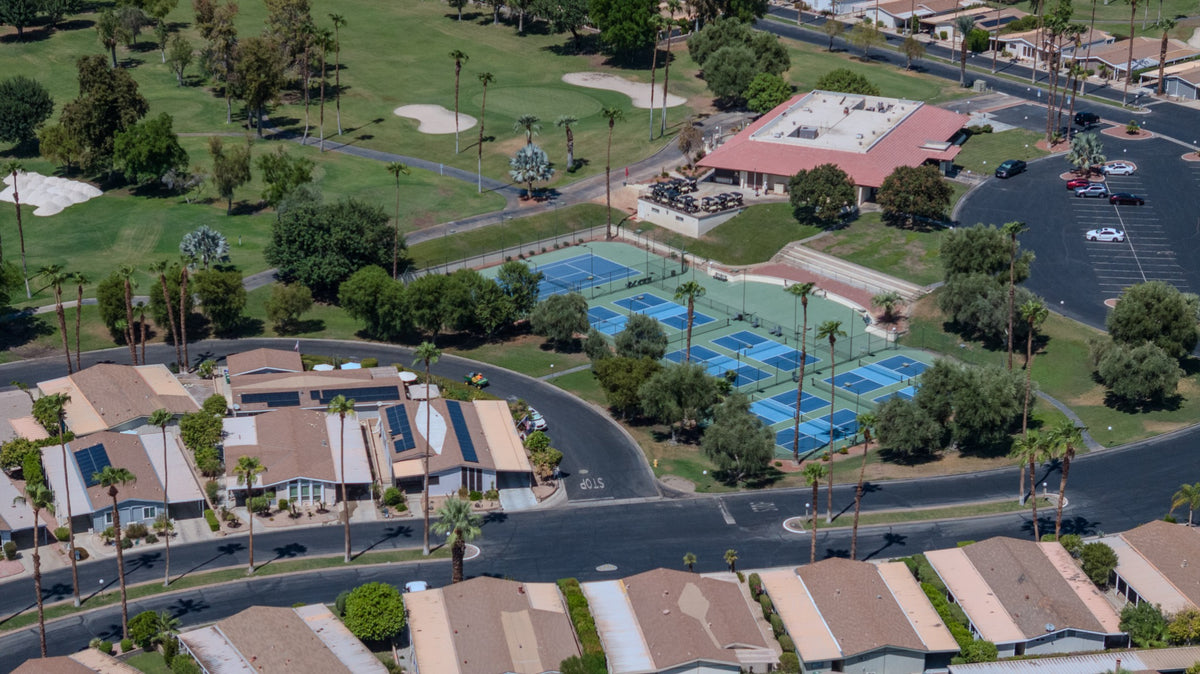 Aerial view of Suncrest Country Club's clubhouse, golf course, pickleball courts and homes in Palm Desert. Photo by Mark Miller, September 10, 2026.