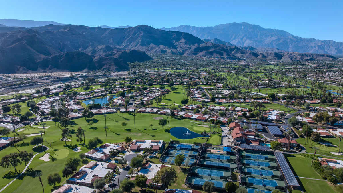 Sunrise Country Club golf course with mountains beyond