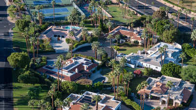 Aerial view of Thunderbird-area homes with swimming pools and landscaped grounds in Rancho Mirage, photographed by Mark Miller on October 13, 2026